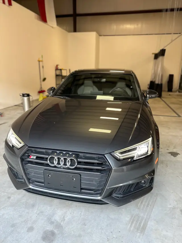 Dark metallic Audi in the VP Wraps studio