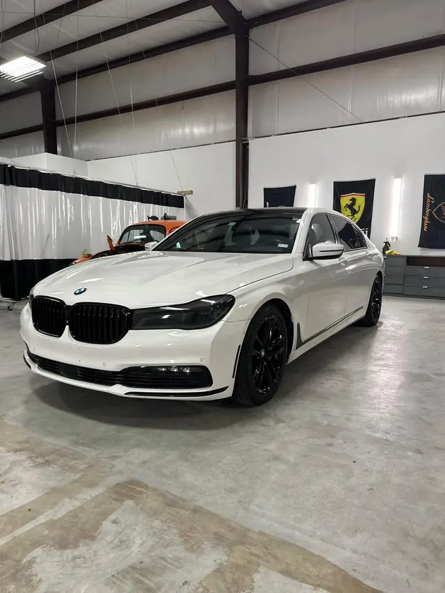 White BMW with chrome delete accents